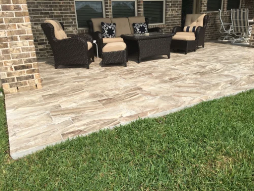 Stylish garden outdoor flooring tiles supply and fitting for a backyard renovation in Dubai.